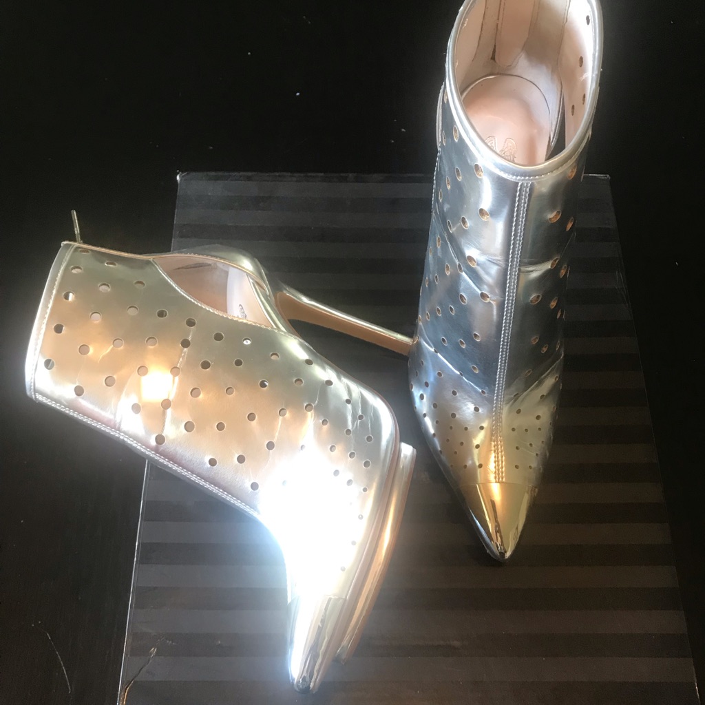 Victoria’s Secret, Silver Ankle Boots.